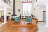 Formal lounge with with stacking doors behind