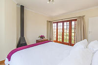 Master Bedroom facing fireplace